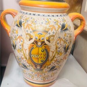 Artistic Ceramic Vase with Vibrant Orange and Yellow Patterns